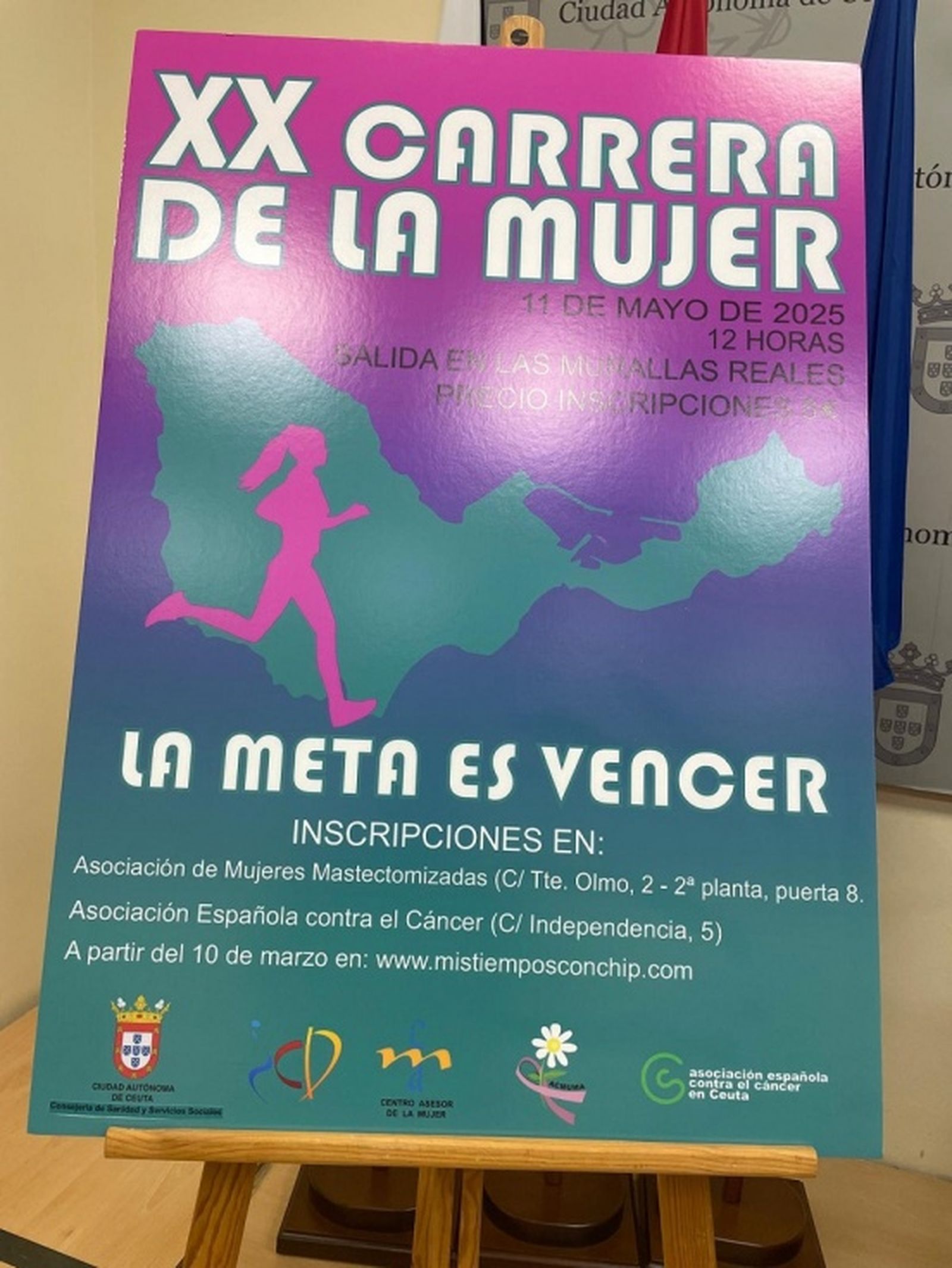 Cartel de la XX Carrera de la Mujer. / FOTO REDUAN