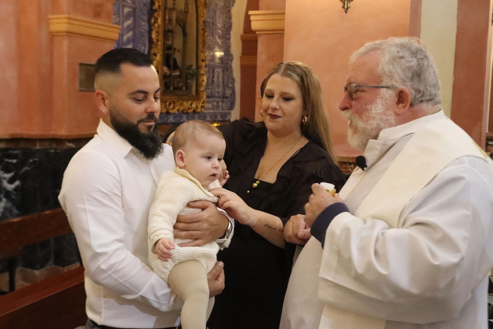 Daniel, Adrián y Noel reciben el Sacramento del bautismo