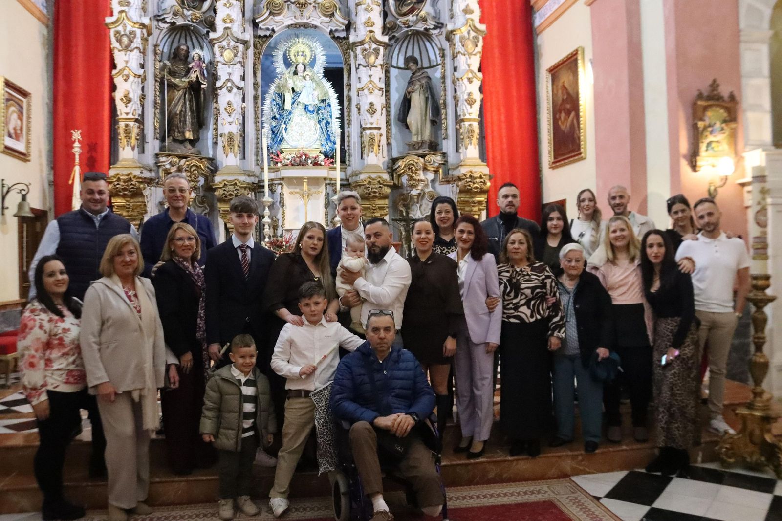 Daniel, Adrián y Noel reciben el Sacramento del bautismo