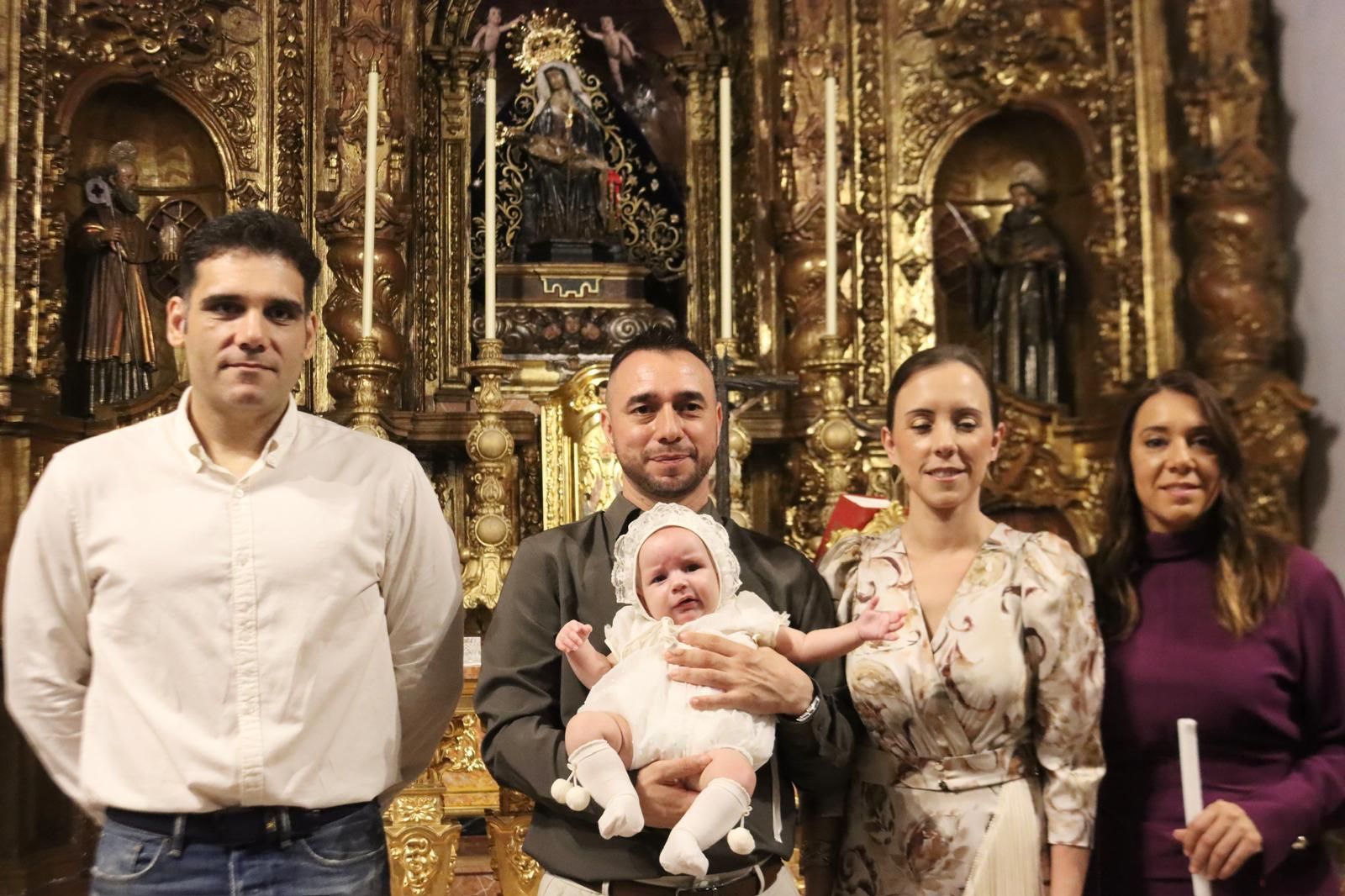 FOTOGALERÍA | Judith e Izan reciben el Sacramento del Bautismo en Nuestra Señora de África