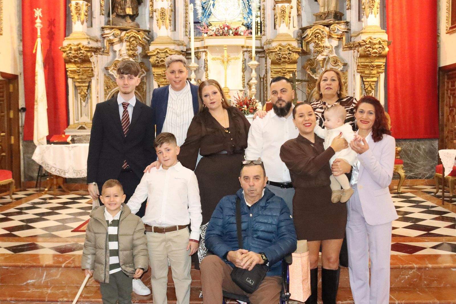 Daniel, Adrián y Noel reciben el Sacramento del bautismo