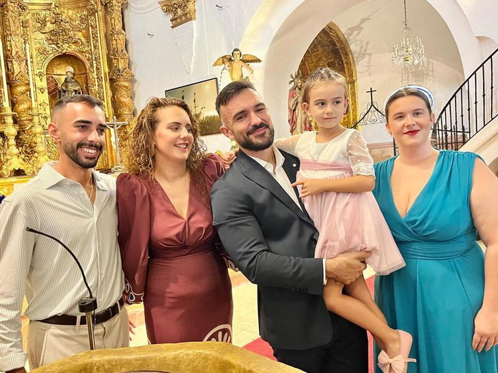 Melissa, José y Teresa reciben el sacramento del bautismo