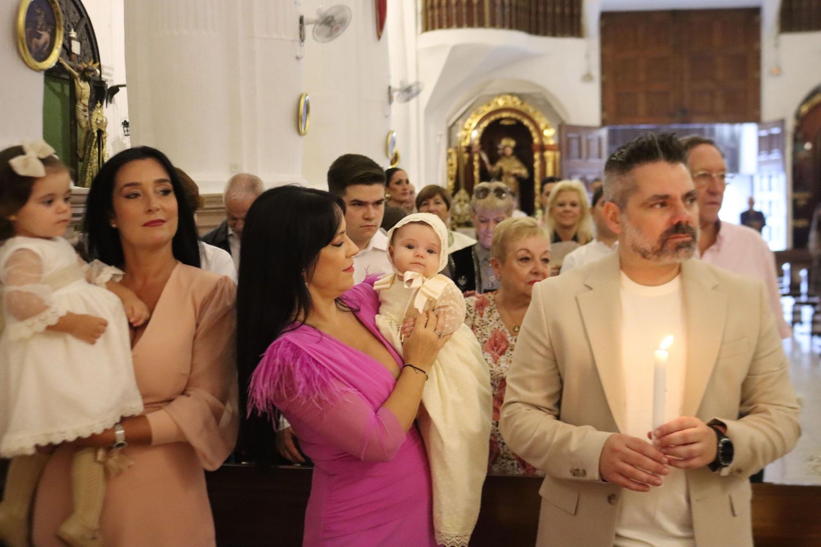 FOTOGALERÍA | Judith e Izan reciben el Sacramento del Bautismo en Nuestra Señora de África