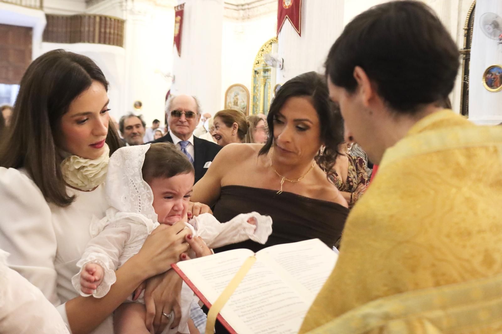 Carlota, Guillermo y Óliver reciben el sacramento del bautismo