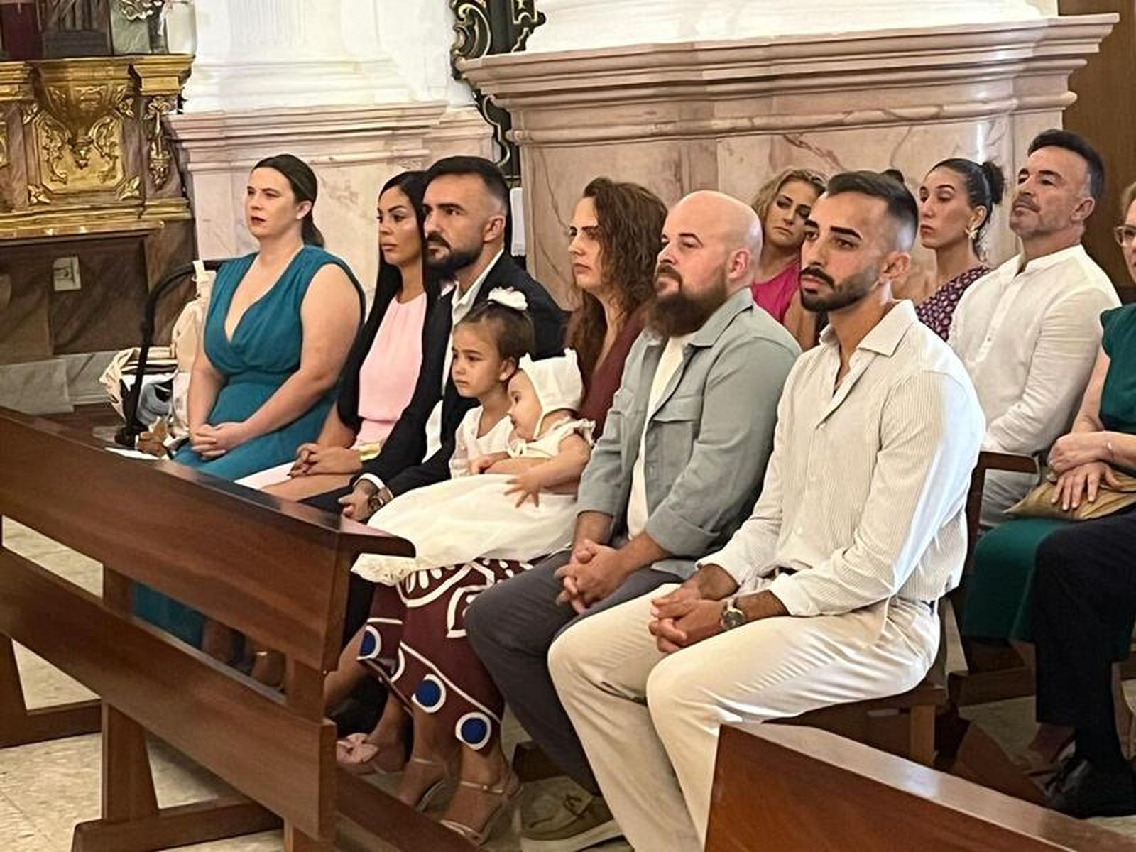 Melissa, José y Teresa reciben el sacramento del bautismo