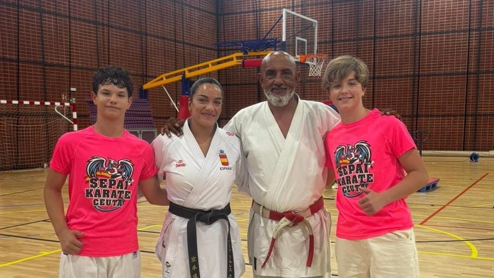 Javier Sánchez y Enrique Rodríguez,  con los técnicos malagueños
