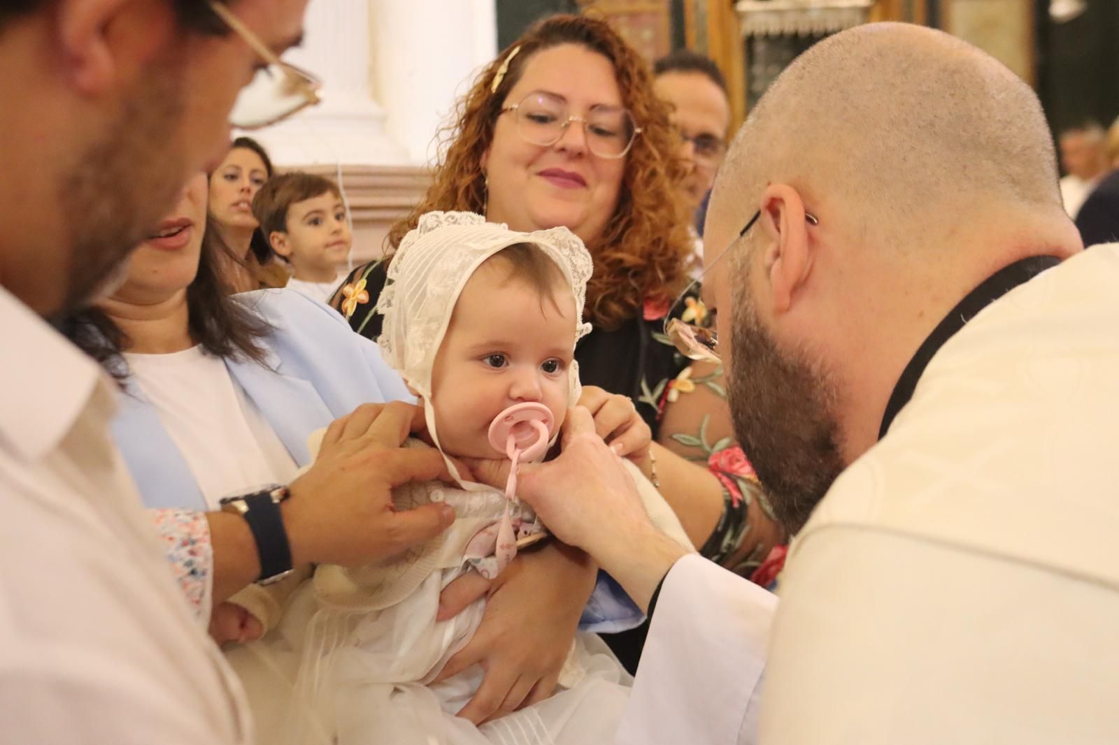 Airam, Carla y Triana reciben el bautismo en la iglesia de Los Remedios