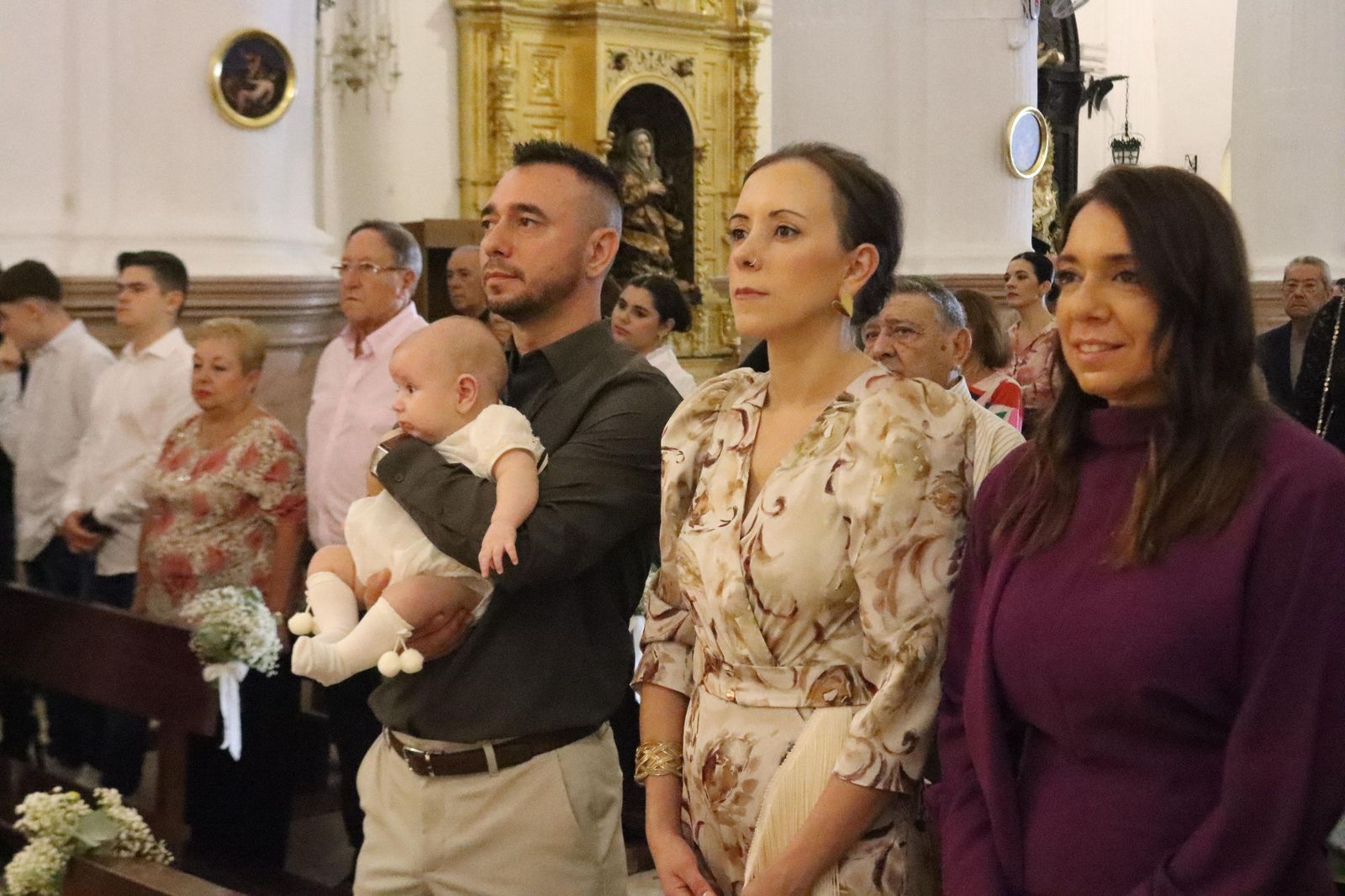 FOTOGALERÍA | Judith e Izan reciben el Sacramento del Bautismo en Nuestra Señora de África