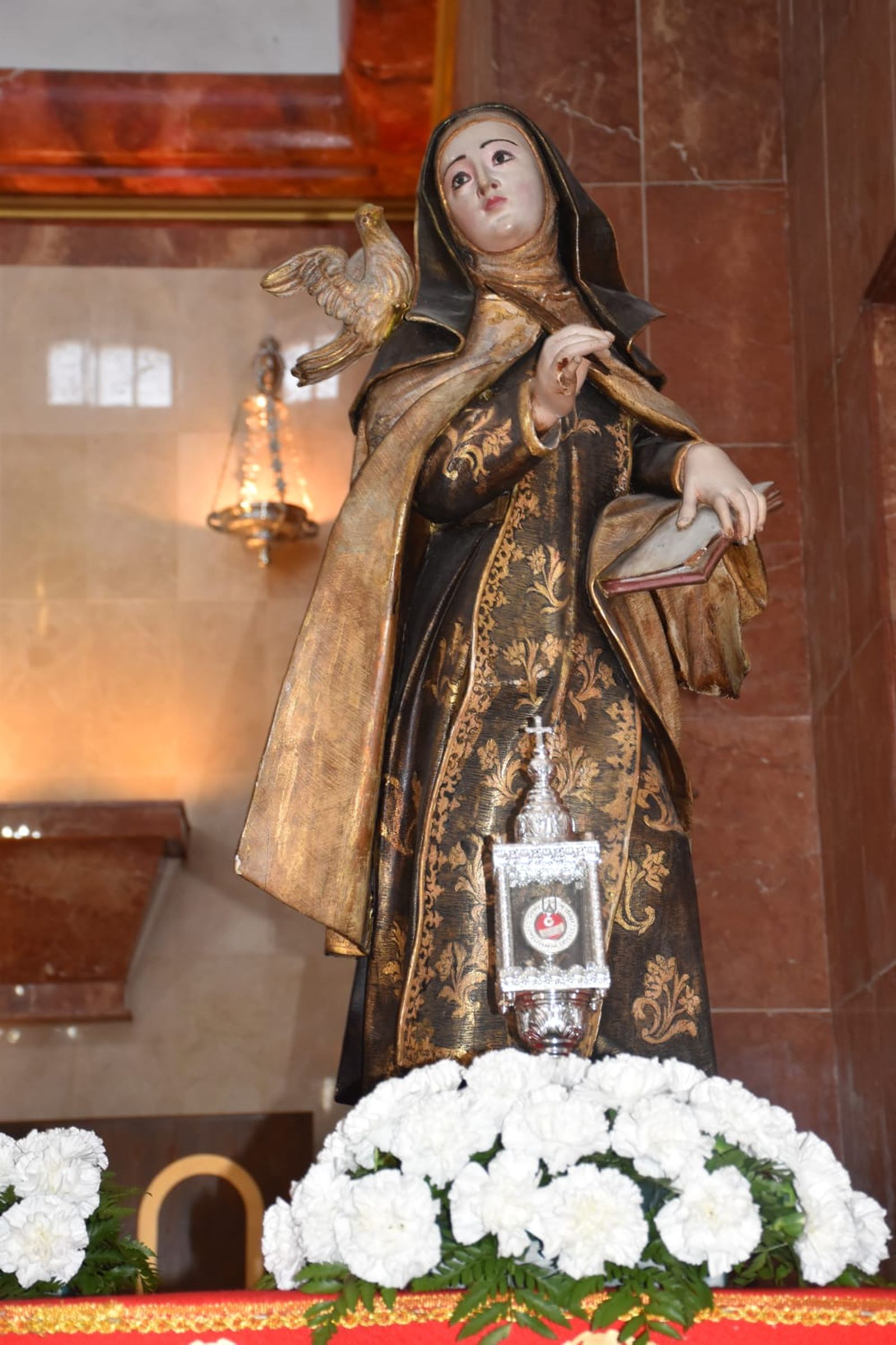 FOTOGALERÍA | Teresa recibe el Sacramento del Bautismo