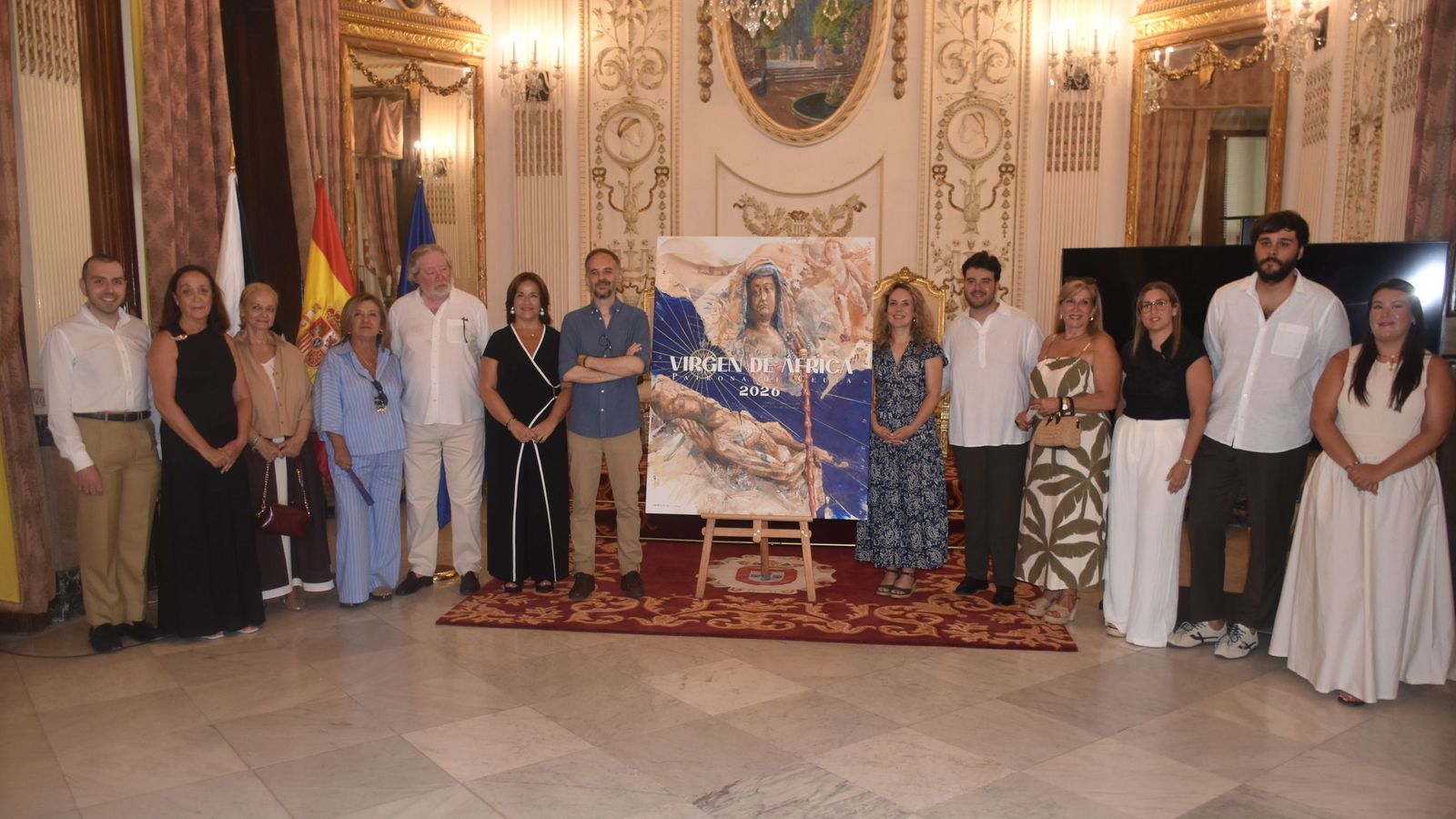 Foto de familiar con el cartel