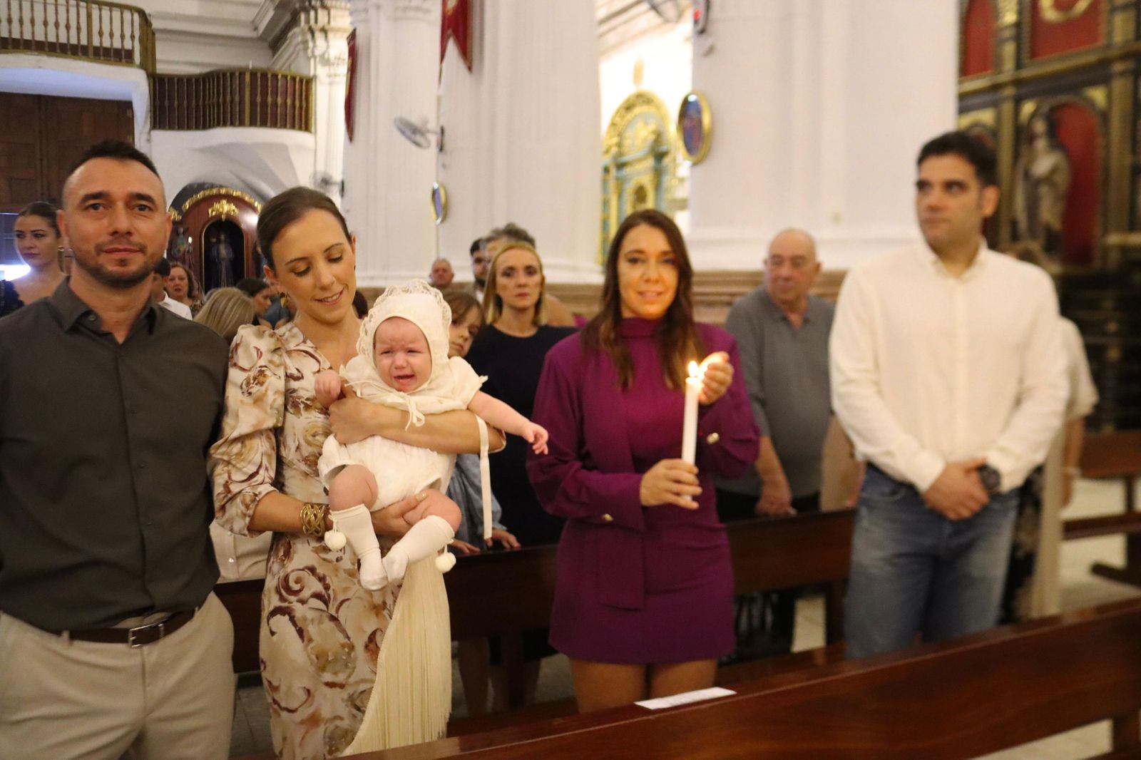 FOTOGALERÍA | Judith e Izan reciben el Sacramento del Bautismo en Nuestra Señora de África
