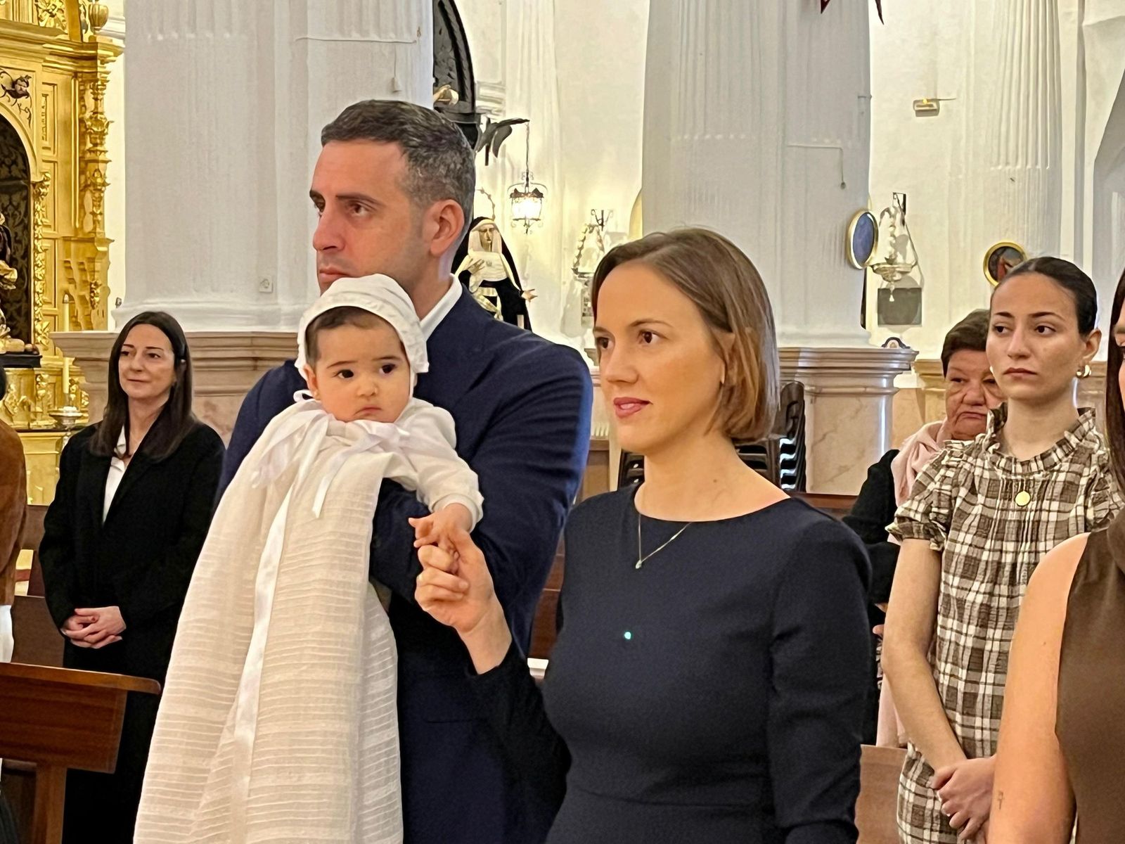 Carmen recibe el Sacramento del Bautismo en el Santuario