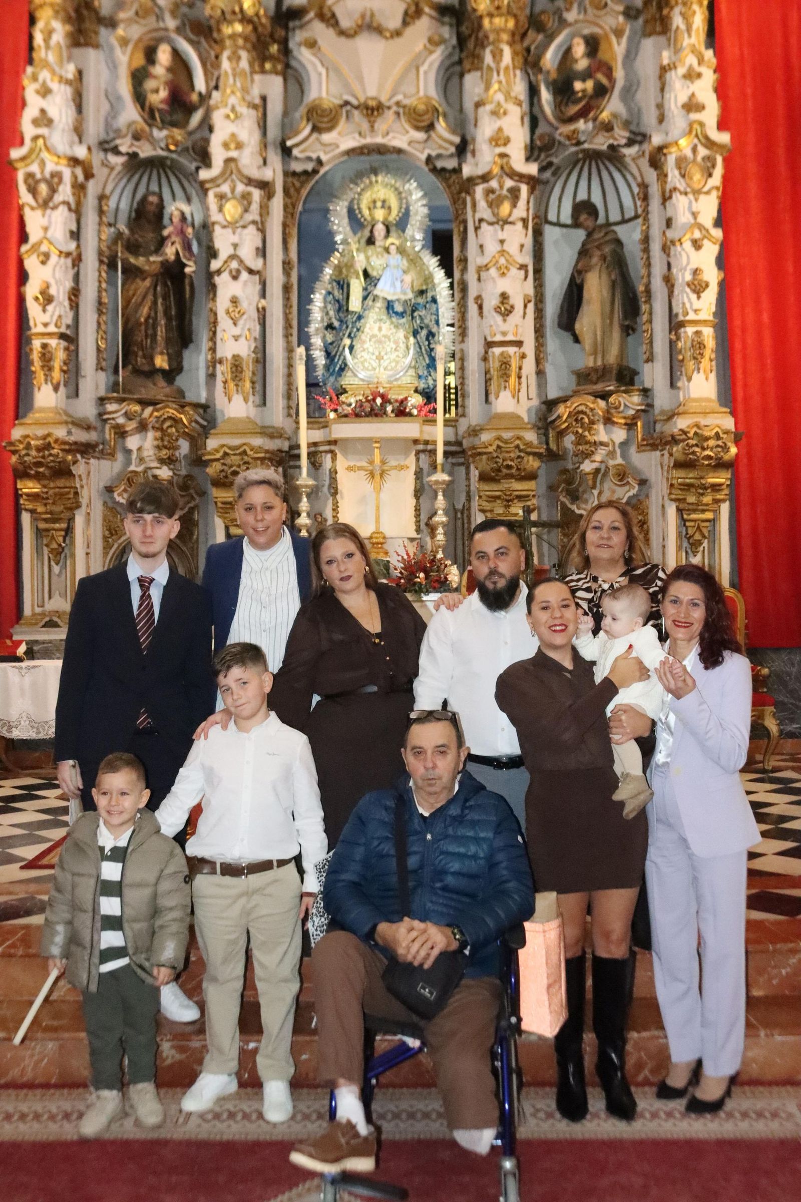 Daniel, Adrián y Noel reciben el Sacramento del bautismo