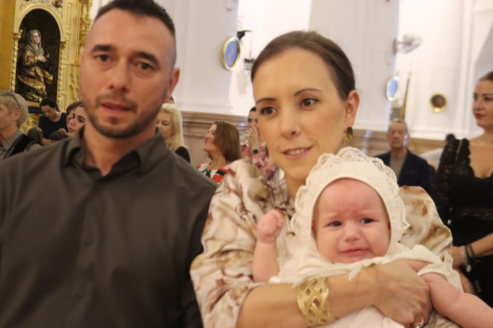 FOTOGALERÍA | Judith e Izan reciben el Sacramento del Bautismo en Nuestra Señora de África