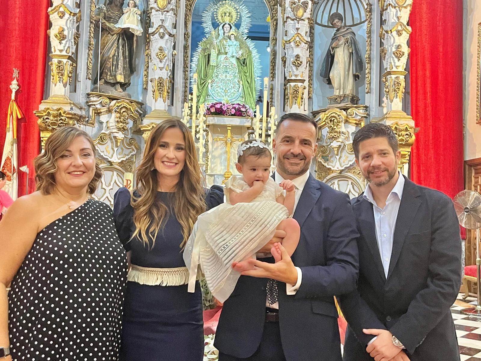 Fabián y Alba reciben el sacramento del bautismo