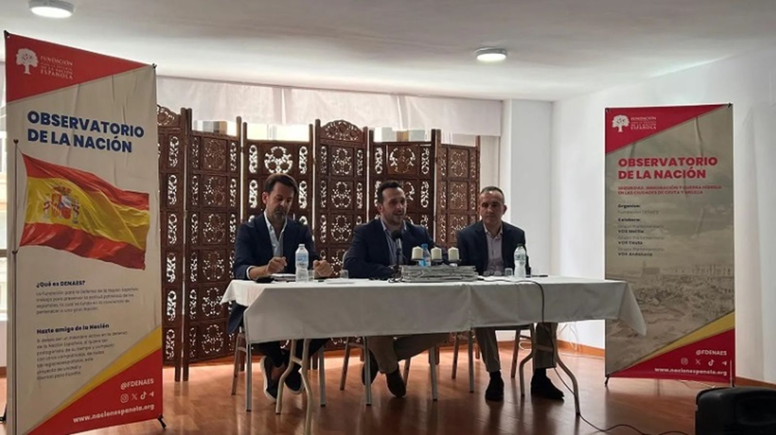 Racaj junto a Redondo en una conferencia en Melilla.