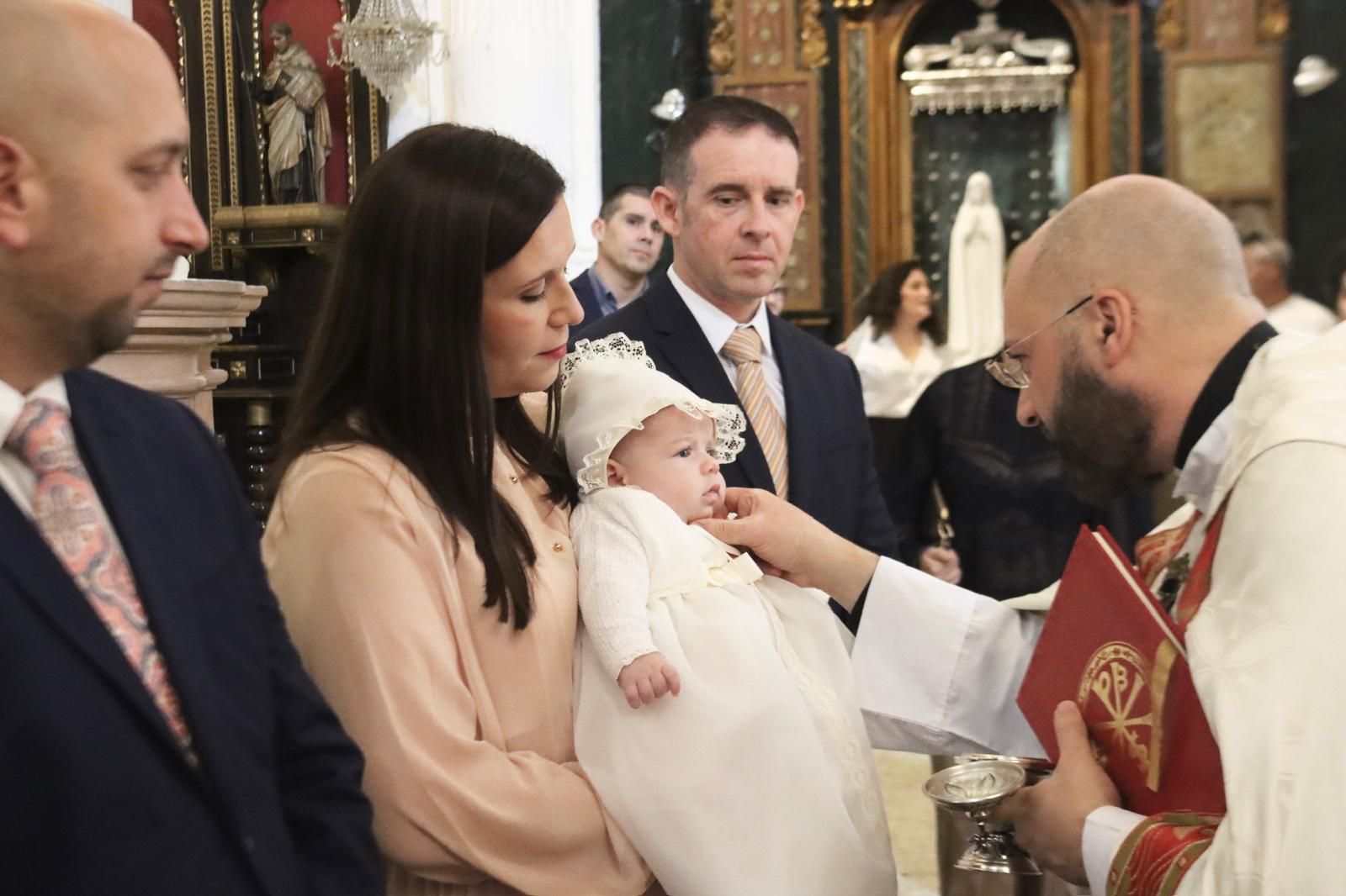 Héctor, Rodrigo y dos Lolas se bautizan en Nuestra Señora de África