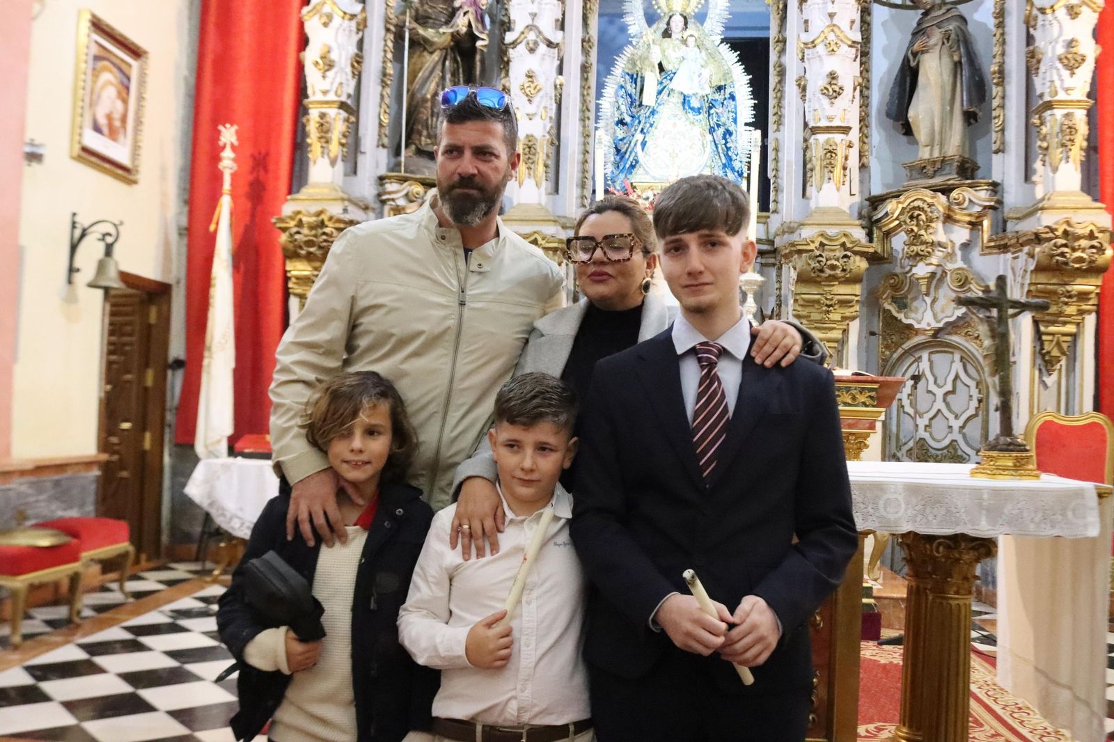 Daniel, Adrián y Noel reciben el Sacramento del bautismo