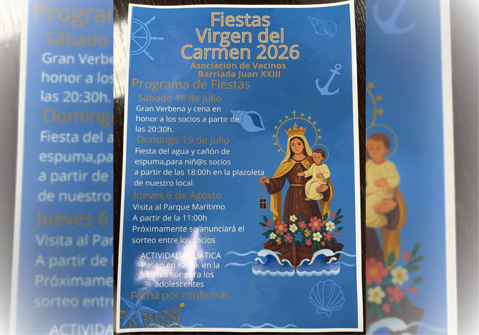Cartel con las actividades de las fiestas de la Virgen del Carmen en la barriada de Juan XXII.